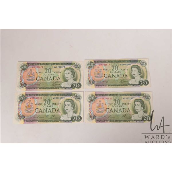 Four 1969 Bank of Canada $20 bills in circulated condition