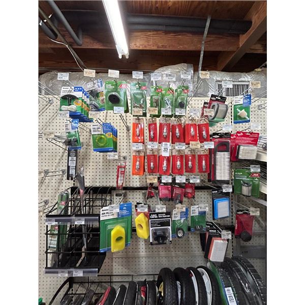Asst. Blade Balancers, Wheel Bolts, Ignition Keys, Spark Plugs, Air Filters On Pegs