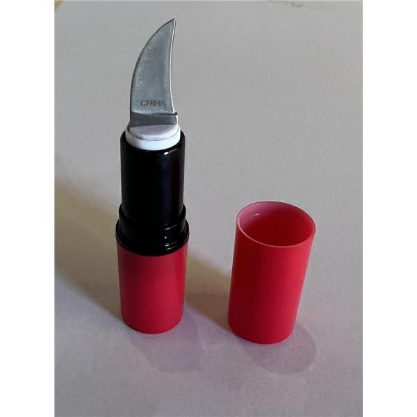 Lipstick case pocket knife prop