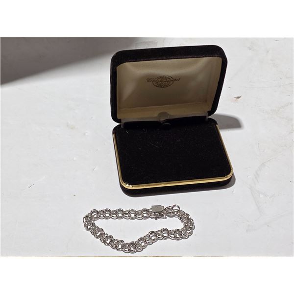 Charm bracelet- marked STG
