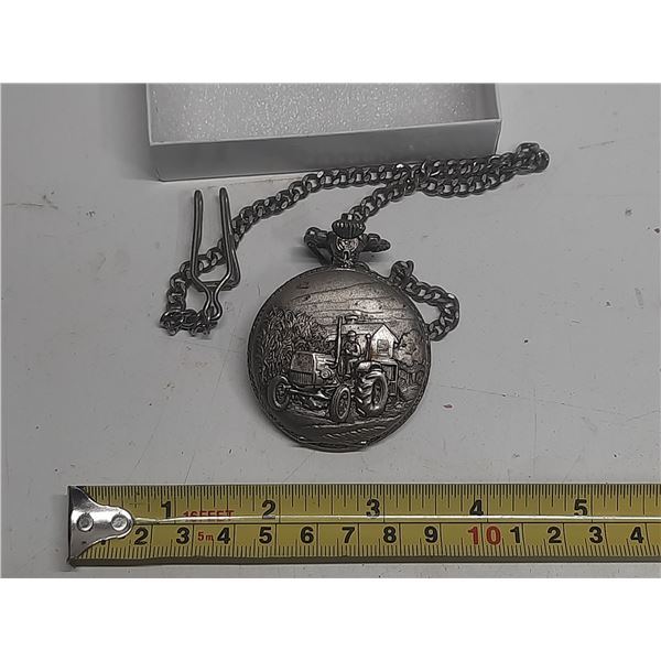 Swisse pocket watch, needs battery- has tractor on cover