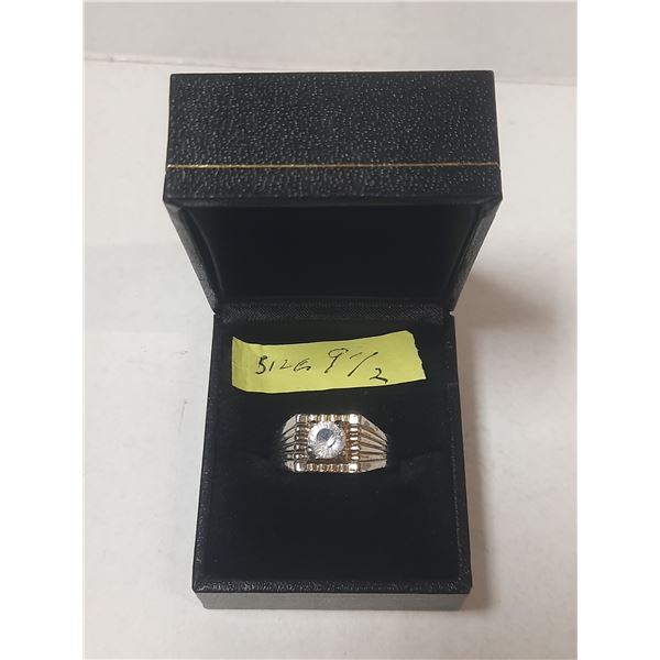 Gold toned size 9.5 mens ring with clear stone