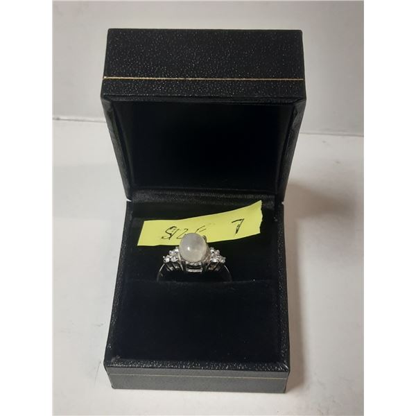 Ladies size 7 ring with opal like stone