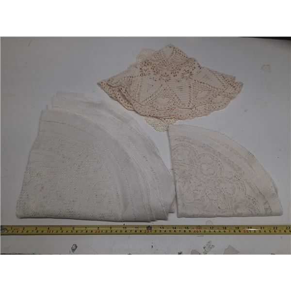 2- 8" square dollies,1 hand crotchet 30' dollies, 5-24' round dollies and 2- 18' round dollies