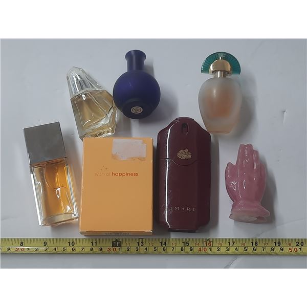 Lot of Perfumes Bottles (Filled) and One Candle.