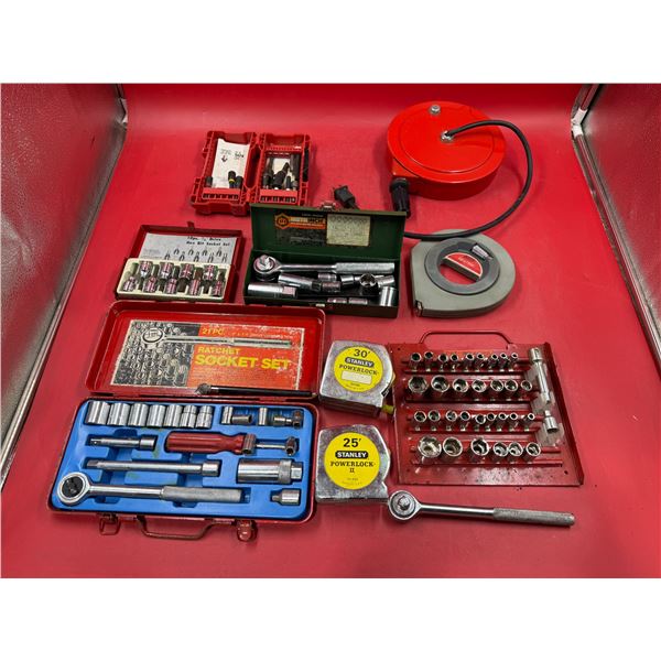 Assorted Tools: Retractable Extension Cord, Sockets, Wrenches, Tape Measures, & Drill Bits