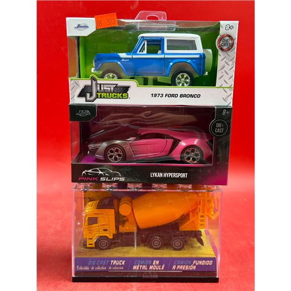 (3) Sealed Die Cast Cars: Jada 1973 Ford Bronco, Pink Slips Lykan, & Concrete Truck