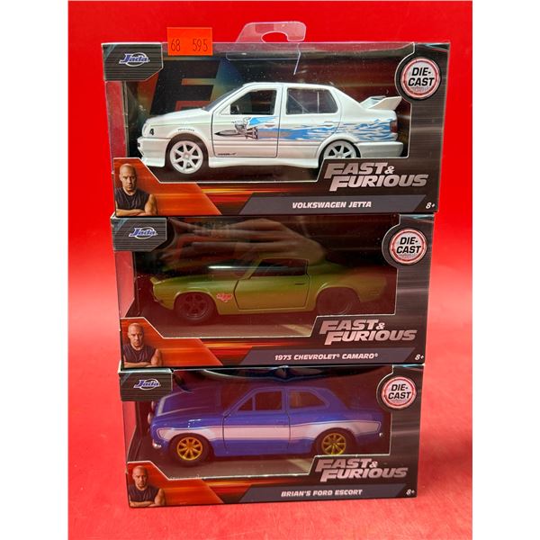 (3) Sealed Fast & Furious Diecast Cars: Volkswagen Jetta, 1975 Chevrolet Camaro, & Brian's Ford Esco