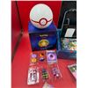 Image 6 : Assorted Pokemon Cards, Poke Ball, Playing Mat, Large Cards, Stickers, Dice, & More