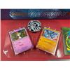 Image 8 : Assorted Pokemon Cards, Poke Ball, Playing Mat, Large Cards, Stickers, Dice, & More