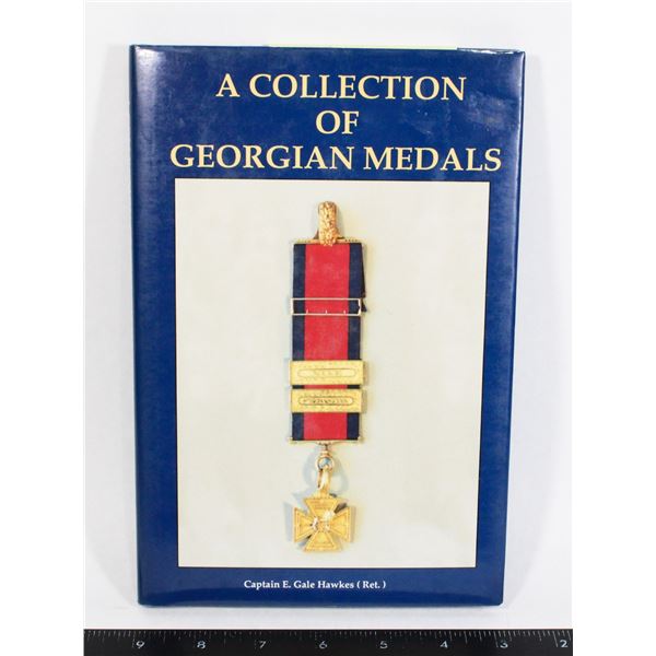 #1016 A collection of Georgian Medals Medal Book