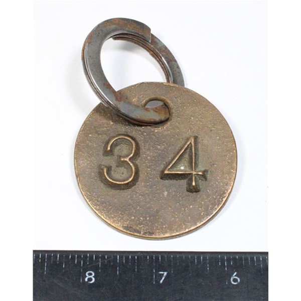 #1541 Vintage Iron Tag Made in Canada 34