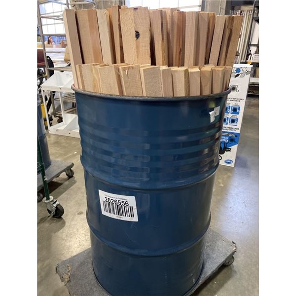METAL BARRELL FULL OF HEMLOCK WOOD PIECES, 1" X 2" X 43"