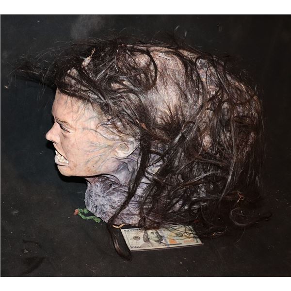 CONSUMED SCREAMING MASS WITH A FACE SEVERED HEAD