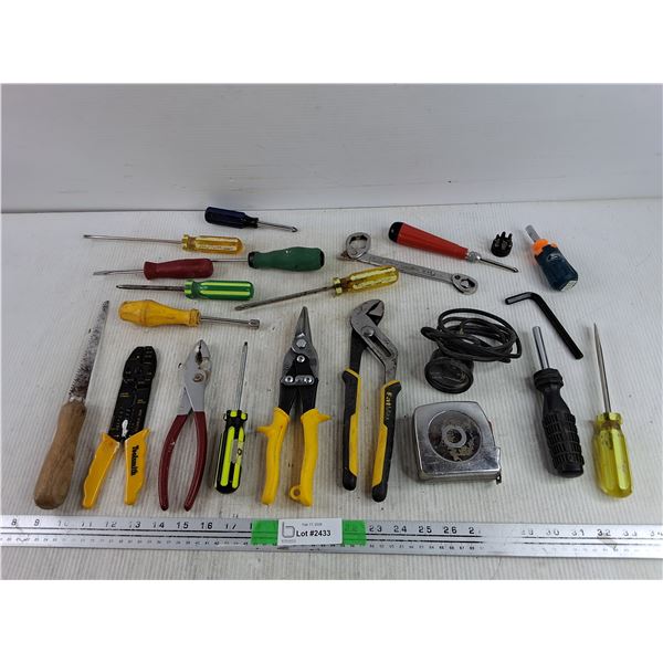 Hole Saw, Tin Shears, Screwdrivers, Measuring Tape, Wire Strippers, Mileage Monitor, Hex Key, Misc