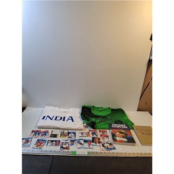 (2) Medium Oversized T- Shirts, (2) Books, Hockey Cards (cannot authenticate)