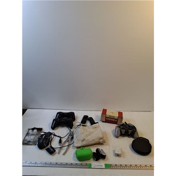 (2) Sony Video Game Controllers, (2) Firestick Remotes, Mouse, Coin Pouch, Misc