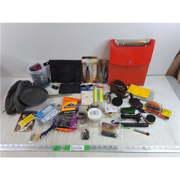 Leather Belt, Digital Watch, 7" Frying Pan, Cleaning Wipes, Aux Headphones, Rope, Misc