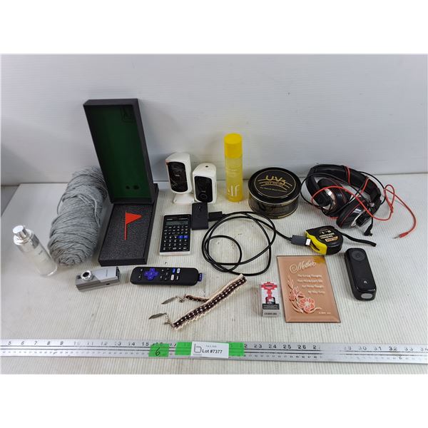 Webcam, Calculator, Yarn, Measuring Tape, Headphones, Wax Polish, Roku Remote, Misc