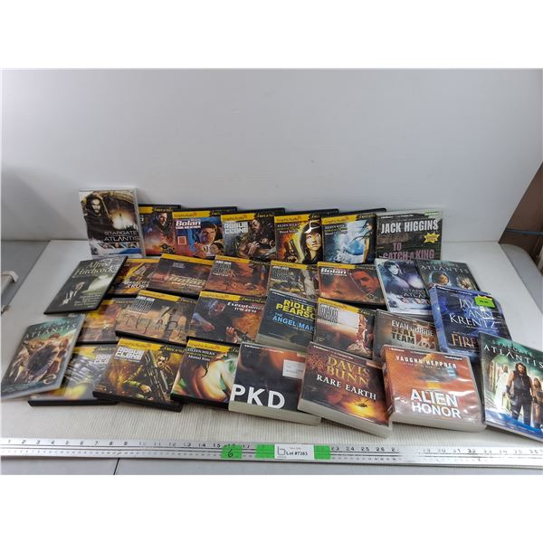 Assorted DVDs & CDs - Rogue Clone, Stargate Atlantis, Mack Bolan, Alfred Hitchcock
