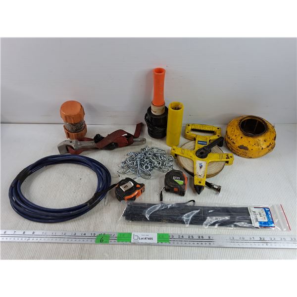 Strap Wrench, Measuring Tapes, Plastic Wrapper, Zip Ties, Cord, Misc