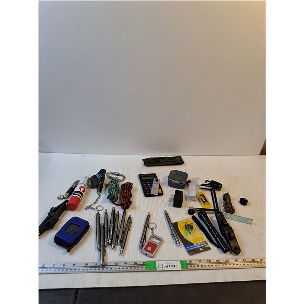 Flashlight, Pens, Calculator, Nylon Rope, Carabiner With Chain, Misc ( everything as is)
