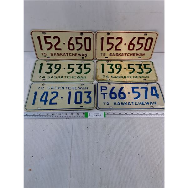 (2) Pairs of Saskatchewan License Plates and (2) Single Plates