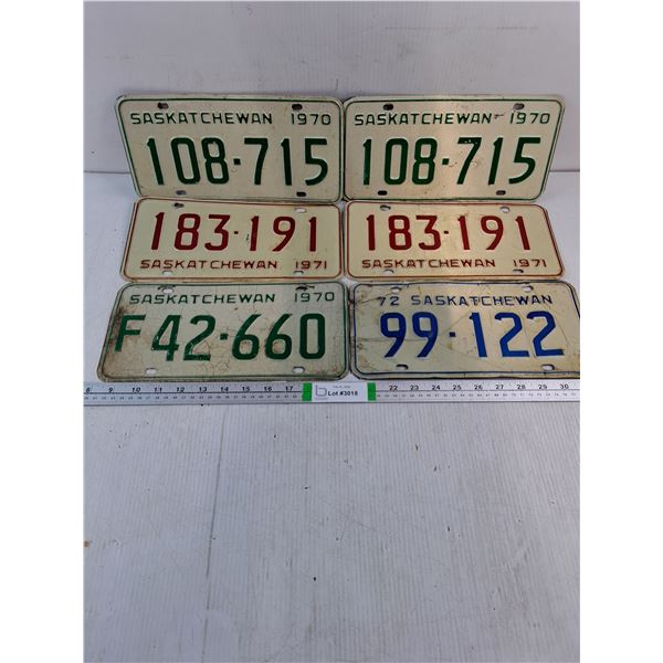 (2) Pairs of Saskatchewan License Plates and (2) Single Plates
