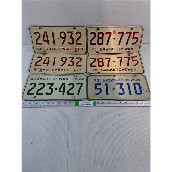 (2) Pairs of Saskatchewan License Plates and (2) Single Plates
