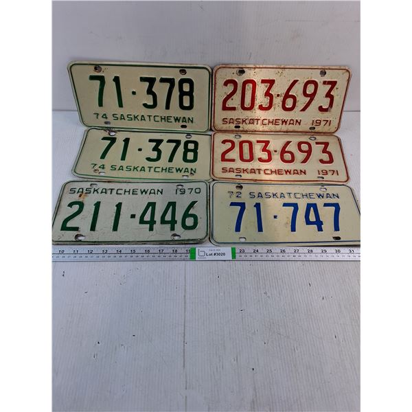 (2) Pairs of Saskatchewan License Plates and (2) Single Plates