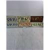 Image 1 : (5) Saskatchewan and (1) Alberta License Plate