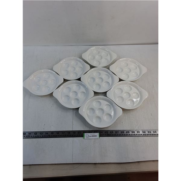 (8) Stokes Porcelain Dishes