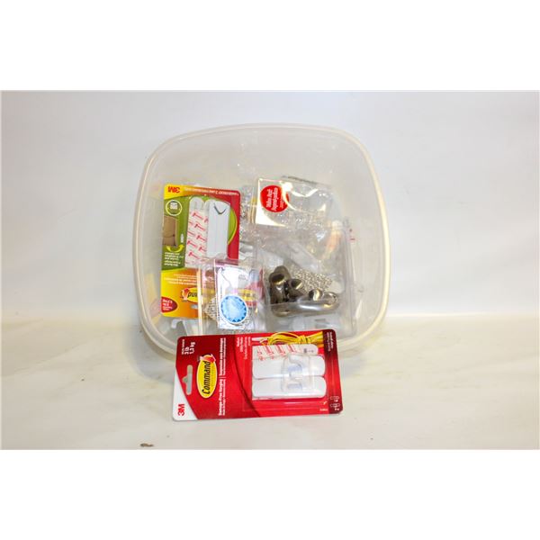 BIN OF COMMAND STRIPS AND HOOKS