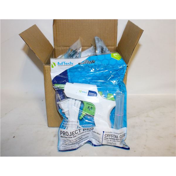 LOT OF GLUE GUNS AND GLUE STICKS