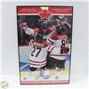 Image 1 : 2010 OLYMPICS CHAMPIONS CROSBY SCORES 34" X 23"