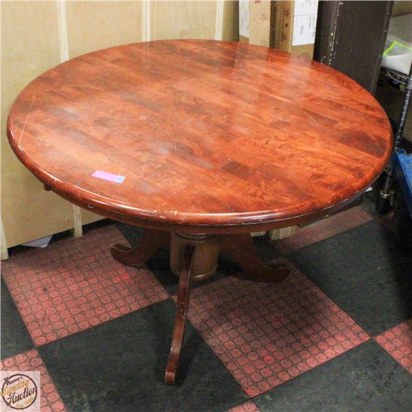 ROUND WOOD TABLE 40" X 30"