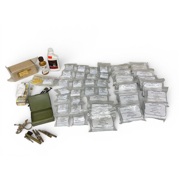 Assorted Firearm Cleaning Supplies Including Solvent, Tools and Patches