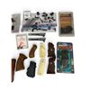 Image 2 : Assorted Grips, Parts and Pieces of Firearms, Base Plates, Forends, Metal Polish Liquid, Choke Tubes