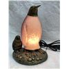 Image 1 : VINTAGE PENGUIN-SHAPED TABLE LAMP WITH A FROSTED GLASS BODY AND A METAL BASE