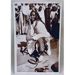 VINTAGE RPPC REAL PHOTO POSTCARD OF A SNAKE CHARME