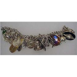 VINTAGE STERLING SILVER CHARM BRACELET - Approx. 2
