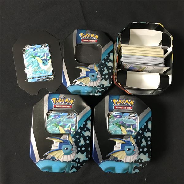 LOT OF 3 VAOPERON TINS 1 VAPOREON TRADING CARD AND SEVERAL LOOSE CARDS
