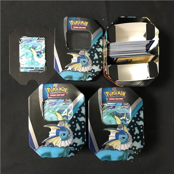 LOT OF 3 VAOPERON TINS 1 VAPOREON TRADING CARD AND SEVERAL LOOSE CARDS