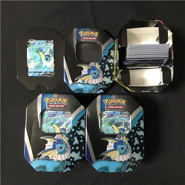 LOT OF 3 VAOPERON TINS 1 VAPOREON TRADING CARD AND SEVERAL LOOSE CARDS