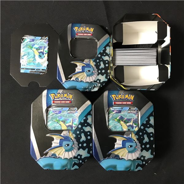 LOT OF 3 VAOPERON TINS 1 VAPOREON TRADING CARD AND SEVERAL LOOSE CARDS