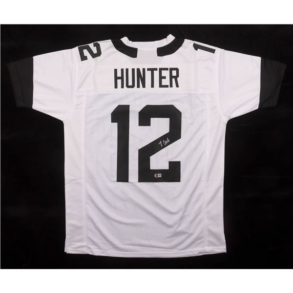 TRAVIS HUNTERS SIGNED FOOTBALL JERSEY - BECKETT COA