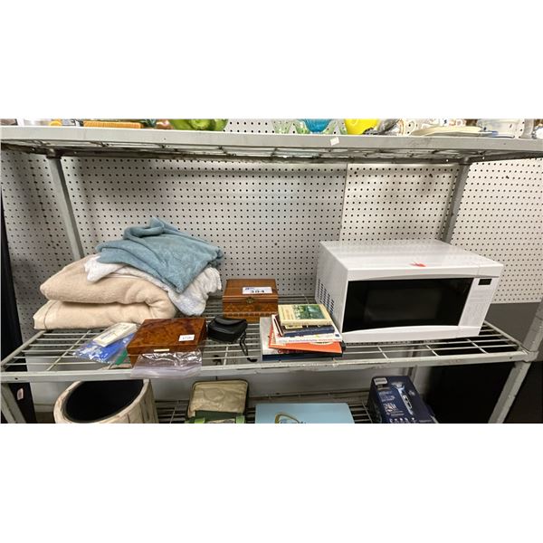 SHELF OF ASSORTED ITEMS INCLUDING; MICROWAVE, BUSHNELL BINOCULARS, JEWELRY BOXES & MORE