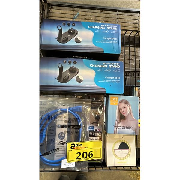LOT OF ASSORTED ITEMS INCLUDING MULTIFUNCTIONAL CHARGING STAND, WIRELESS EARBUDS, USB PORTS AND MORE