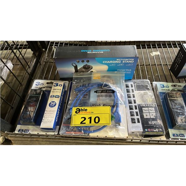 LOT OF ASSORTED ITEMS INCLUDING MULTIFUNCTIONAL CHARGING STAND, WIRELESS EARBUDS, USB PORTS AND MORE