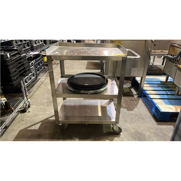 STAINLESS STEEL ROLLING CART WITH STACK OF ROUND PLASTIC TRAYS